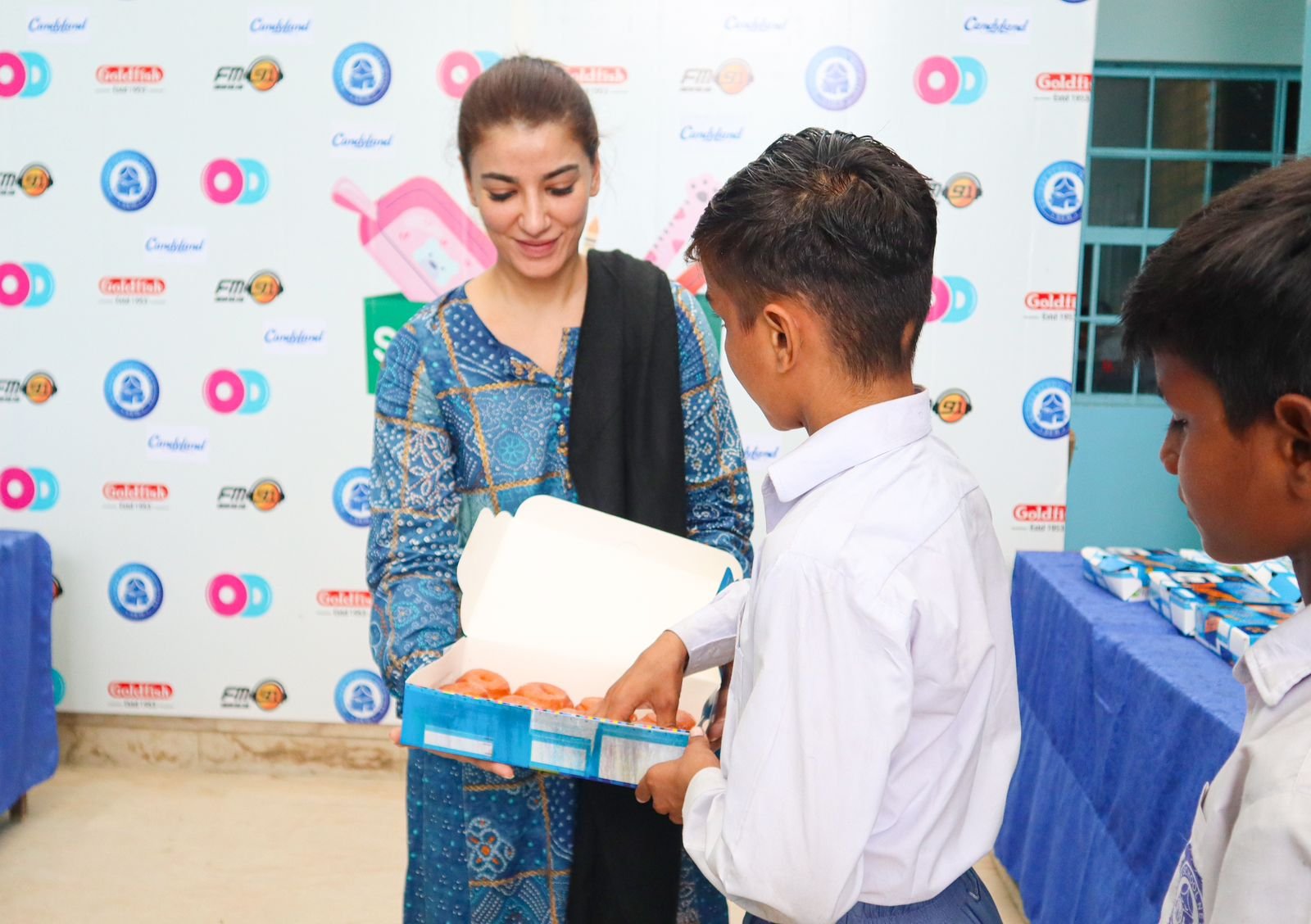 FM91 Team Spreads Joy at Baithak School with Shoebox Donations